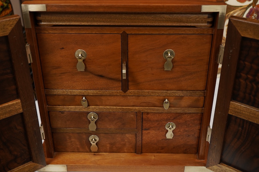 A Chinese three sectioned incense case, a two door fitted cabinet- 29cm high and a sliding topped box